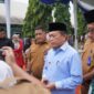 Gubernur Al Haris mengapresiasi penyerahan murid baru secara adat Melayu Jambi di SMA Negeri 1 Muaro Jambi sebagai upaya memperkuat pendidikan karakter dan melestarikan budaya lokal.